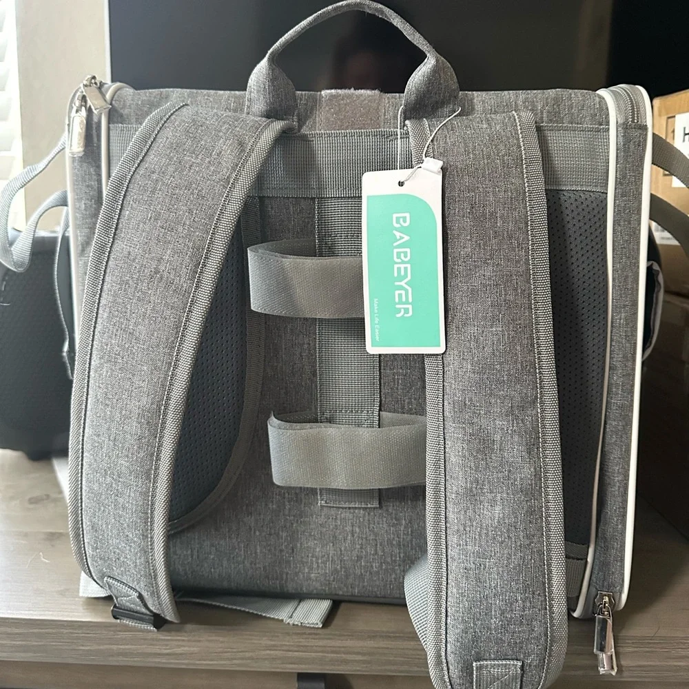 Dog bag is also suitable for the car. It's totally new, with label and plastic.